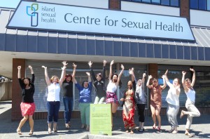 Staff and volunteers jumping for joy