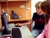 young couple learning about sexual health on line
