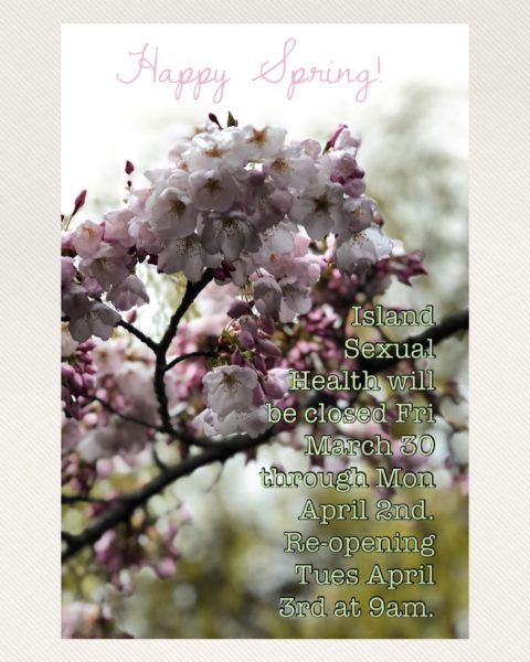 Photo of cherry blossoms that states the Island Sexual Health Quadra St clinic will be closed all weekend.